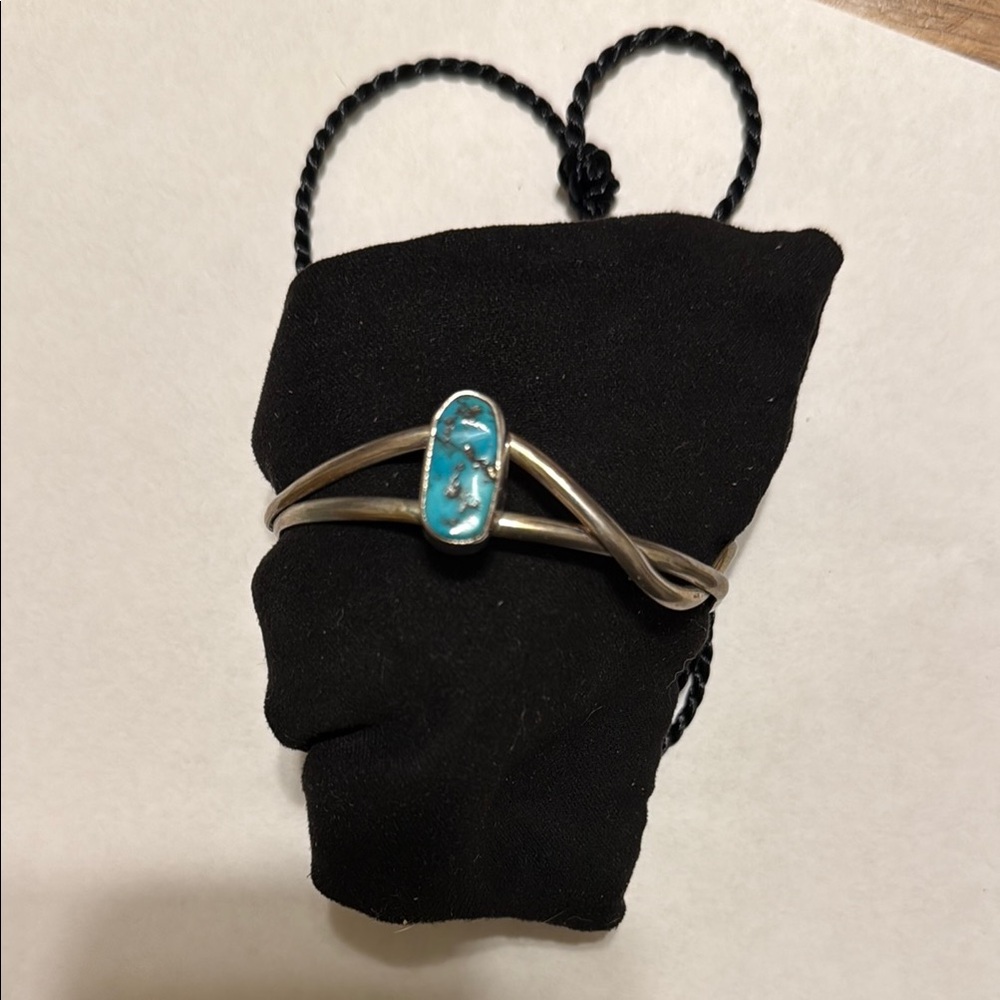 Vintage Silver Native American Bracelet with Turquoise Accents